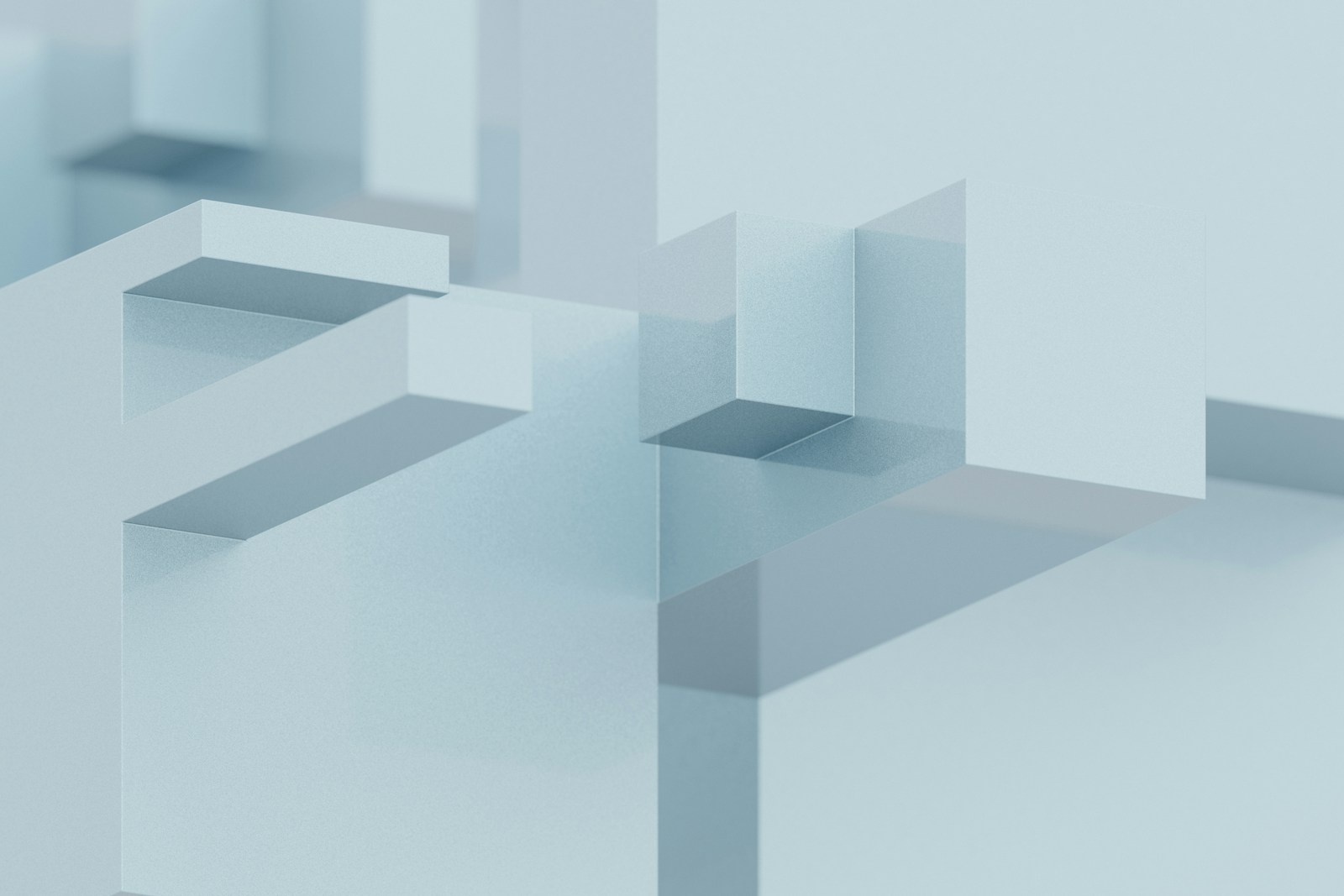 A blurry photo of a white wall